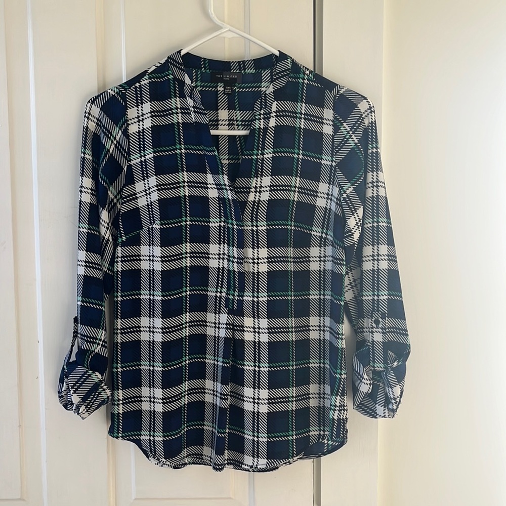 The Limited partial button down blouse with button sleeves in classic print.